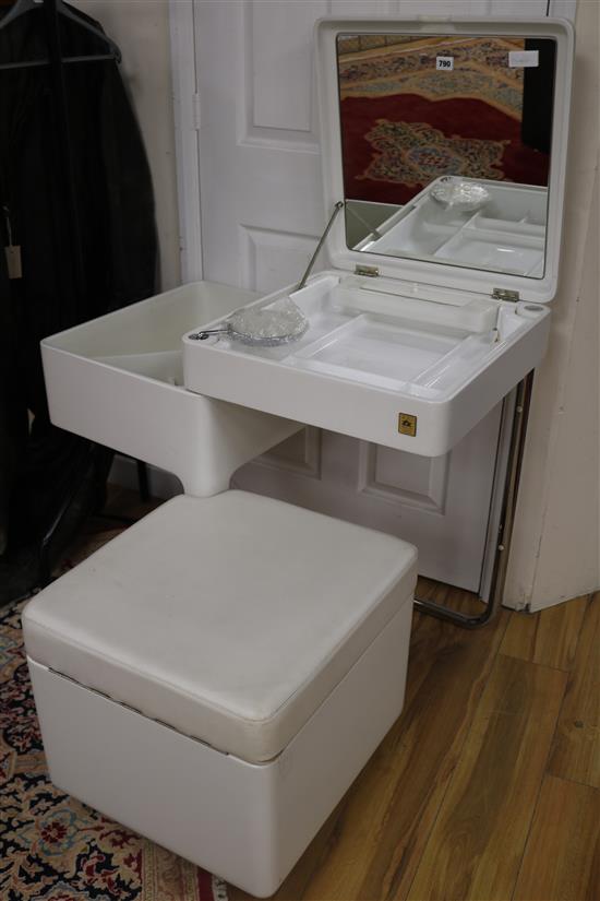 A Carlo Ubinati white Ciarly Vanity, 1970s, with rising top, fitted mirrors and revolving centre section W.49.5cm H.81.5cm W.50cm
